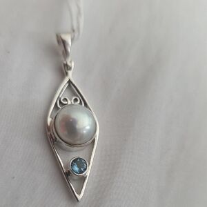 Elegant Sterling Silver Pendant with Pearl and Blue Topaz Gemstone